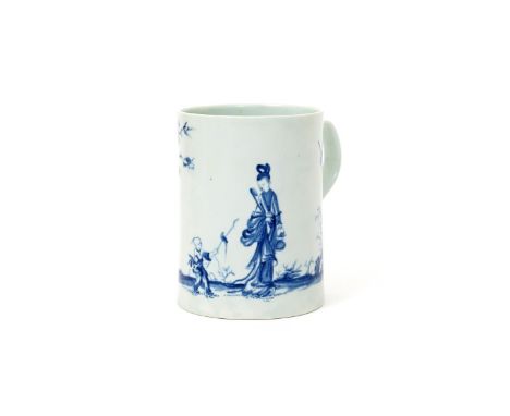 A large Worcester blue and white mug  c.1756, the slightly waisted form painted with the Walk in the Garden pattern, with bir