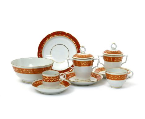 A Barr Worcester part tea service  c.1792-1804, decorated with a continuous gilded foliate band reserved on a wide orange ban