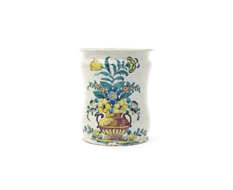 A large Italian maiolica albarello  dated 1787, possibly Liguria, one side painted with a two-handled vase issuing tall flowe