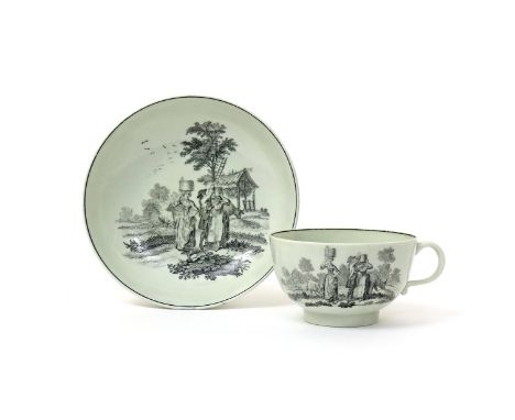 A Worcester teacup and saucer  c.1765, printed in black with The Milkmaids, a farmhand helping two maids to balance pails of 