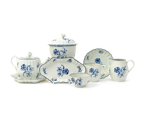 A Worcester blue and white solitaire tea service  c.1760-70, of fluted form, painted with the Gillyflower pattern, open cresc