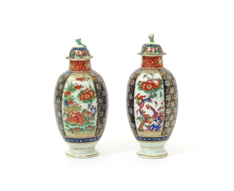 A pair of Worcester tea canisters and covers  c.1770, the ovoid bodies richly decorated with a Japan pattern of Oriental flow