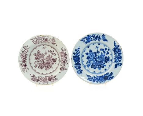 A Dublin delftware plate and a soup plate  mid 18th century, the plate painted in blue, the bowl in manganese, with chrysanth
