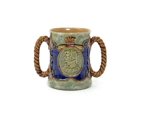 A Royal Doulton stoneware commemorative loving cup  c.1905, the slightly waisted cylindrical form applied with two ropetwist 