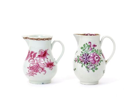 Two Worcester milk jugs  c.1765-70, one painted in puce camaieu, possibly in the Giles atelier, with a large flower spray and