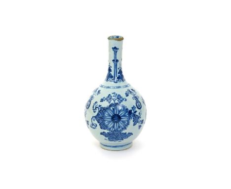 A delftware guglet or water bottle  c.1770, probably London, the rounded body painted in blue with three large specimens of l