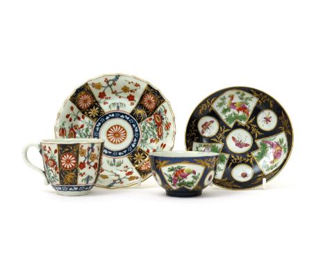 A Worcester teabowl and saucer  c.1768, painted with three fan-shaped panels of fancy birds, and circular panels of flying in