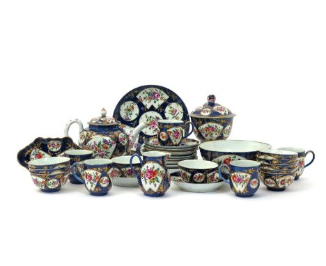 A good Worcester tea service  c.1770, brightly painted with fan-shaped panels containing colourful European flowers, reserved