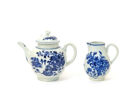 A Worcester blue and white teapot and cover  c.1770-75, and a large milk jug, both printed with the Fence pattern, a zig-zag 