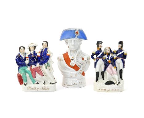 Two Staffordshire flatback figures of the Death of Nelson 19th century, the naval hero flanked in each case by two officers, 