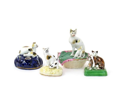 Four English porcelain models of a cat with a kitten  1st half 19th century, one Samuel Alcock, each sitting with head turned