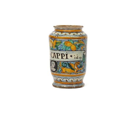 A small Italian maiolica albarello  dated 1613, probably Siena, the slightly flared cylindrical form painted with a winged ma