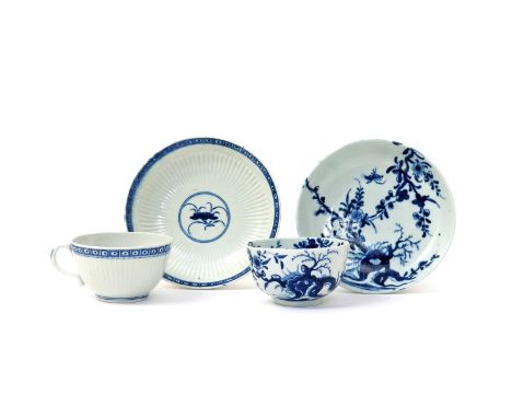 A Worcester blue and white teabowl and saucer  c.1758-60, painted with the Prunus Root pattern, and a teacup and saucer with 