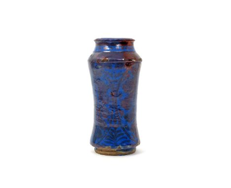 A Spanish (Talavera) lustre-glazed pottery albarello  c.1700, the tall waisted form decorated with three large stylized leave