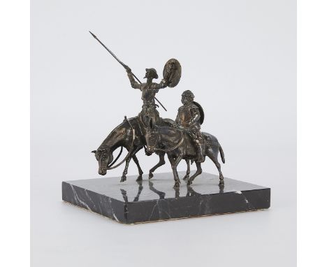 Metal sculpture in the form of two figures, one on horseback with a raised spear and the other on a donkey or ass. Depicting 