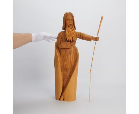Leo J. Salazar (American, 1931-1991). Taos, New Mexico folk art wooden carving of a saint with flowing robes carrying a staff