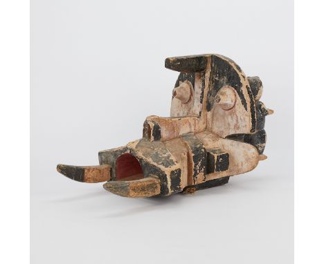 African Igbo or Wawa, Nigeria elephant mask carved with two standing figures with outstretched arms.Provenance: From collecti