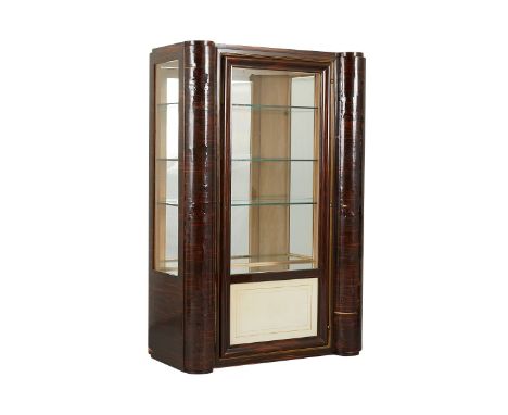 Art Deco burlwood display cabinet with four shelves - three inserted glass - and three hidden drawers.Provenance: From the Es