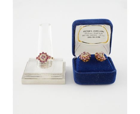 Set of 14k yellow gold stud earrings and ring. Each inset with a central ruby surrounded by an inner halo of cubic zirconia a