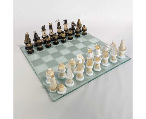 Italian Venetian Murano glass chess set infused with gold leaf. One half of the set in white and the other half of the set in