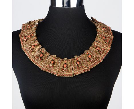 Tibetan 19th century necklace consisting of twelve trapezoidal, one rounded, and two triangular brass segments. Each with a t