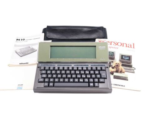 A 1980s cased Olivetti M10 Portable Computer with instructions, 31 cm x 23 cm