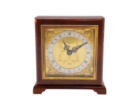 A 1940s Elliott walnut mantle clock, retailed by Johnston and Court, Carlisle, having a key wound movement, 14.5 x 6.5 x 15 c
