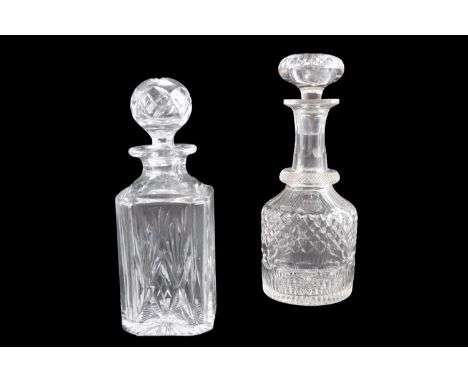 A late 19th / early 20th Century finely cut glass decanter together with a traditional spirit decanter with hollow stopper, f