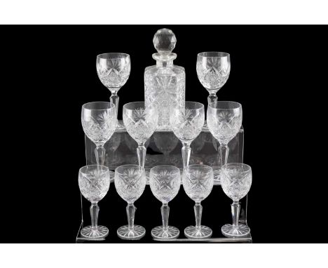 A set of Edinburgh crystal drinking glasses comprising six white and six red wine glasses, six brandy balloons, six whisky tu