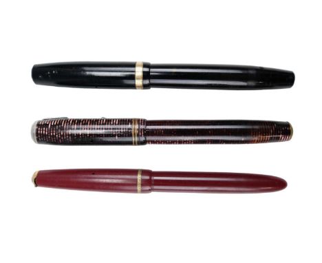 Three vintage Parker fountain pens comprising two Duofolds and a Slimfold