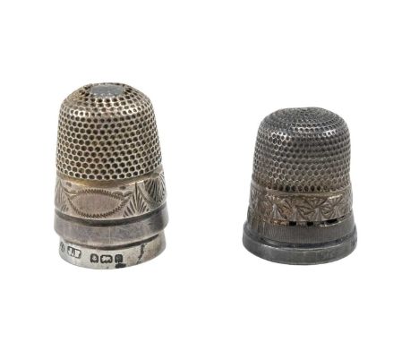 Two silver thimbles, one being a souvenir of Bournemouth, and a steel cored Dorcas type thimble, silver thimbles respectively