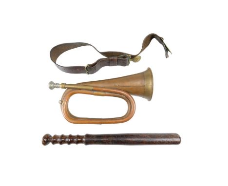 A Boy's Brigade belt, a bugle and a wooden truncheon