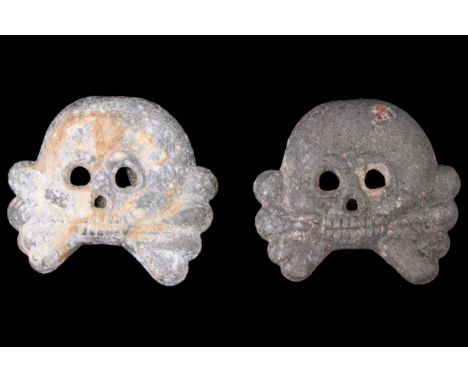 A pair of German Third Reich Army Panzer zinc tunic collar patch skulls