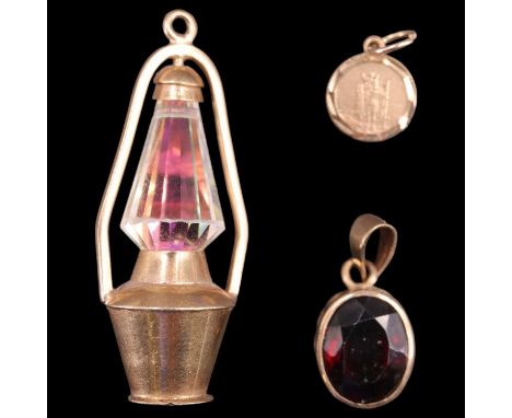 A 1970s 9 ct gold novelty pendant / charm in the form of a lantern, together with a bezel-set oval garnet of approximately 2.