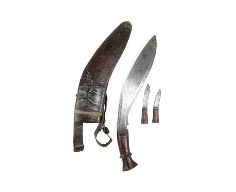 A military type kukri, in scabbard with by knives and military type frog, Great War / Second World War, 39 cm
