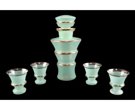 A moderne turquoise flashed and gilt glass liqueur decanter and four matching glasses, circa 1950s, decanter 25 cm