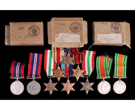 A group of Second World War British campaign medals and three medal cartons