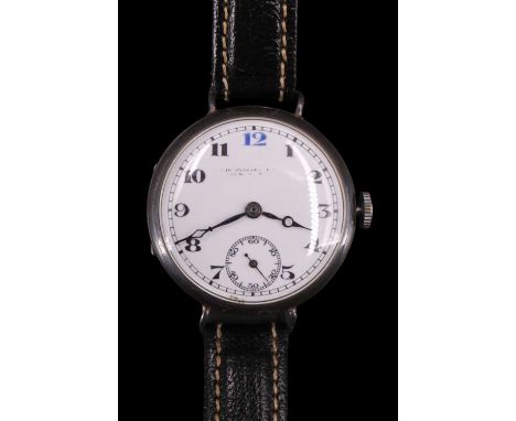 A 1920s silver "trench"-type wristwatch, having a Swiss movement and white enamel dial with Arabic numerals and blued steel h