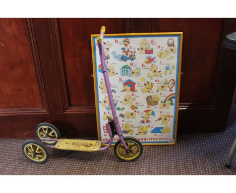 A vintage Triang scooter and a framed Eric Hill "Spot the Dog" alphabet poster