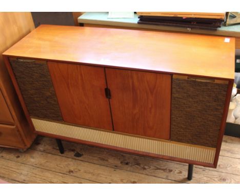 A vintage Decca Radiogram with turntable and original paperwork. This item is sold as a Collectors item only and has not been