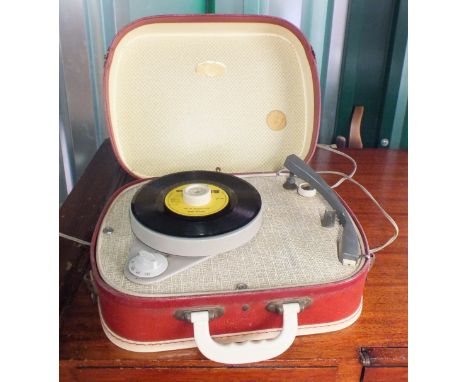 A 1950's portable Fidelity record player.  This item is sold as a Collectors item only and has not been subject to an electri