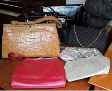 A collection of twelve vintage and retro style purses and handbags including a mock crocodile example