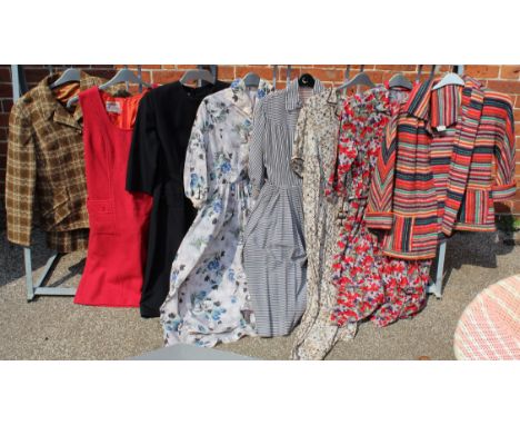 A mixed lot of lady's vintage clothing including a jacket, suit and dresses