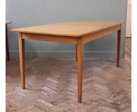 A Robert Heritage Hamilton range light teak extending dining table and five dining chairs including one carver