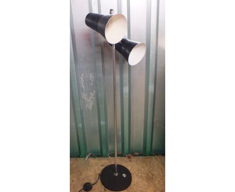 A mid Century Scandinavian black and metal floor lamp with two adjustable lights. This item is sold as a Collectors item only