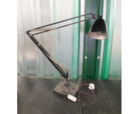 A black vintage 1930s/40s Herbert Terry "The Anglepoise" lamp on square shaped base.  This item is sold as a Collectors item 