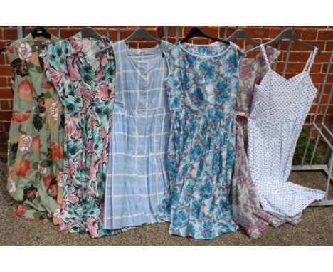 A collection of six vintage floral print summer dresses