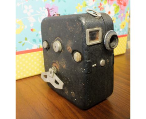 A vintage pathescope 8mm cine camera