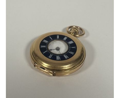 An 18ct gold and enamel small half-hunter fob watch, late 19th century, the outer case with a blue enamel band with Roman num
