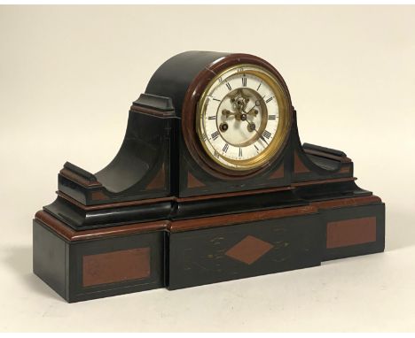 A Victorian slate twin-train drum head mantel clock, the case, of architectural form, inset with rouge marble panels and gilt